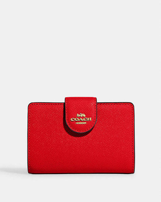 Coach Medium Corner Zip Wallet in Bright Poppy in gold accessories